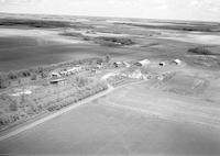 Aerial photograph of a farm near Borden, SK (32-40-8-W3)