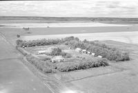 Aerial photograph of a farm near Cutknife, SK (33-44-22-W3)