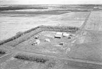 Aerial photograph of a farm near Borden, SK (41-8-W3)