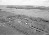 Aerial photograph of a farm near Maidstone, SK (22-47-23-W3)