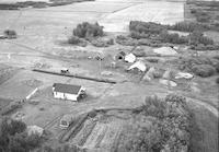 Aerial photograph of a farm near Turtleford, SK (52-21-W3)