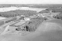 Aerial photograph of a farm near Tallman, SK (9-44-7-W3)