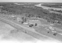 Aerial photograph of a farm near Blaine Lake, SK (45-7-W3)