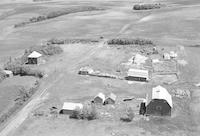 Aerial photograph of a farm near Paradise Hill, SK (51-23-W3)