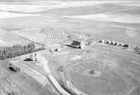 Aerial photograph of a farm near Kerrobert, SK (34-21-W3)