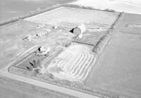 Aerial photograph of a farm near Unity, SK (41-22-W3)