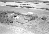 Aerial photograph of a farm near Mullingar, SK (46-12-W3)