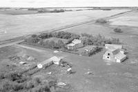 Aerial photograph of a farm near Hafford, SK (44-10-W3)