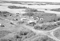 Aerial photograph of a farm near Dulwich, SK (49-20-W3)