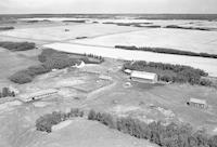 Aerial photograph of a farm near Mayfair, SK (46-12-W3)