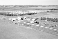 Aerial photograph of a farm near Borden, SK (41-8-W3)