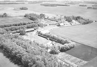 Aerial photograph of a farm near Borden, SK (41-9-W3)