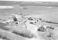 Aerial photograph of a farm in Saskatchewan (48-19-W3)