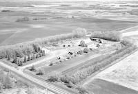 Aerial photograph of a farm near Vawn, SK (13-48-19-W3)