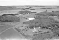 Aerial photograph of a farm near Maidstone, SK (48-23-W3)