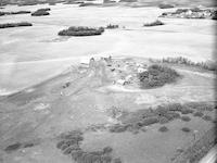 Aerial photograph of a farm near Hafford, SK (44-10-W3)