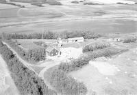 Aerial photograph of a farm near Paradise Hill, SK (51-23-W3)