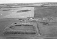 Aerial photograph of a farm near Borden, SK (3-40-9-W3)