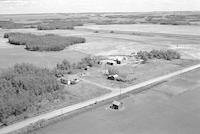 Aerial photograph of a farm near Mayfair, SK (46-12-W3)