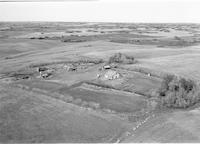 Aerial photograph of a farm near Cutknife, SK (15-43-21-W3)