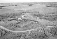 Aerial photograph of a farm near Phippen, SK (41-21-W3)