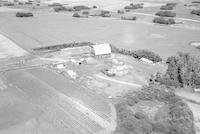 Aerial photograph of a farm near Wilkie, SK (38-21-W3)
