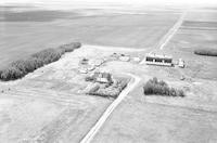 Aerial photograph of a farm near Blaine Lake, SK (45-7-W3)