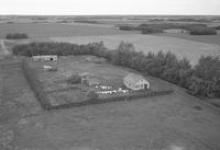 Aerial photograph of a farm near Blaine Lake, SK (45-7-W3)