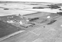 Aerial photograph of a farm near Richard, SK (44-12-W3)