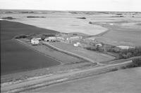 Aerial photograph of a farm near Meadowlake, SK