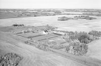 Aerial photograph of a farm near Paradise Hill, SK (52-24-W3)