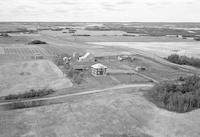 Aerial photograph of a farm near Maidstone, SK (47-23-W3)