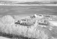 Aerial photograph of a farm near Richard, SK (44-12-W3)