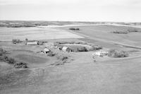 Aerial photograph of a farm near Hafford, SK (44-10-W3)