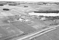 Aerial photograph of a farm near Hafford, SK (44-10-W3)