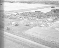 Aerial photograph of a farm near Turtleford, SK (51-20-W3)