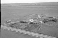 Aerial photograph of a farm near Landis, SK (37-19-W3)