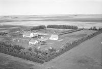 Aerial photograph of a farm near Speers, SK (44-11-W3)