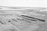 Aerial photograph of a farm near Paynton, SK (46-21-W3)