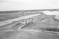 Aerial photograph of a farm near Maymont, SK (41-12-W3)