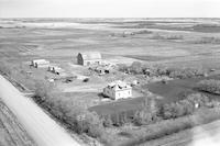 Aerial photograph of a farm near Four Corners, SK (18-5-W3)