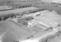 Aerial photograph of a farm in Saskatchewan (44-12-W3)