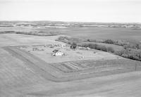 Aerial photograph of a farm near Richard, SK (44-12-W3)