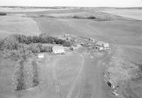 Aerial photograph of a farm near Paynton, SK (46-21-W3)