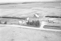 Aerial photograph of a farm near Hafford, SK (44-10-W3)