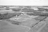 Aerial photograph of a farm near Hafford, SK (44-10-W3)