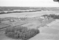 Aerial photograph of a farm near Marcelin, SK (46-6-W3)