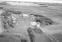 Aerial photograph of a farm near Marcelin, SK (46-6-W3)