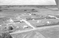 Aerial photograph of a farm near Dulwich, SK (49-20-W3)