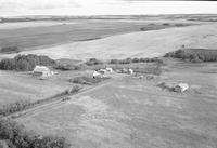 Aerial photograph of a farm near Blaine Lake, SK (45-7-W3)